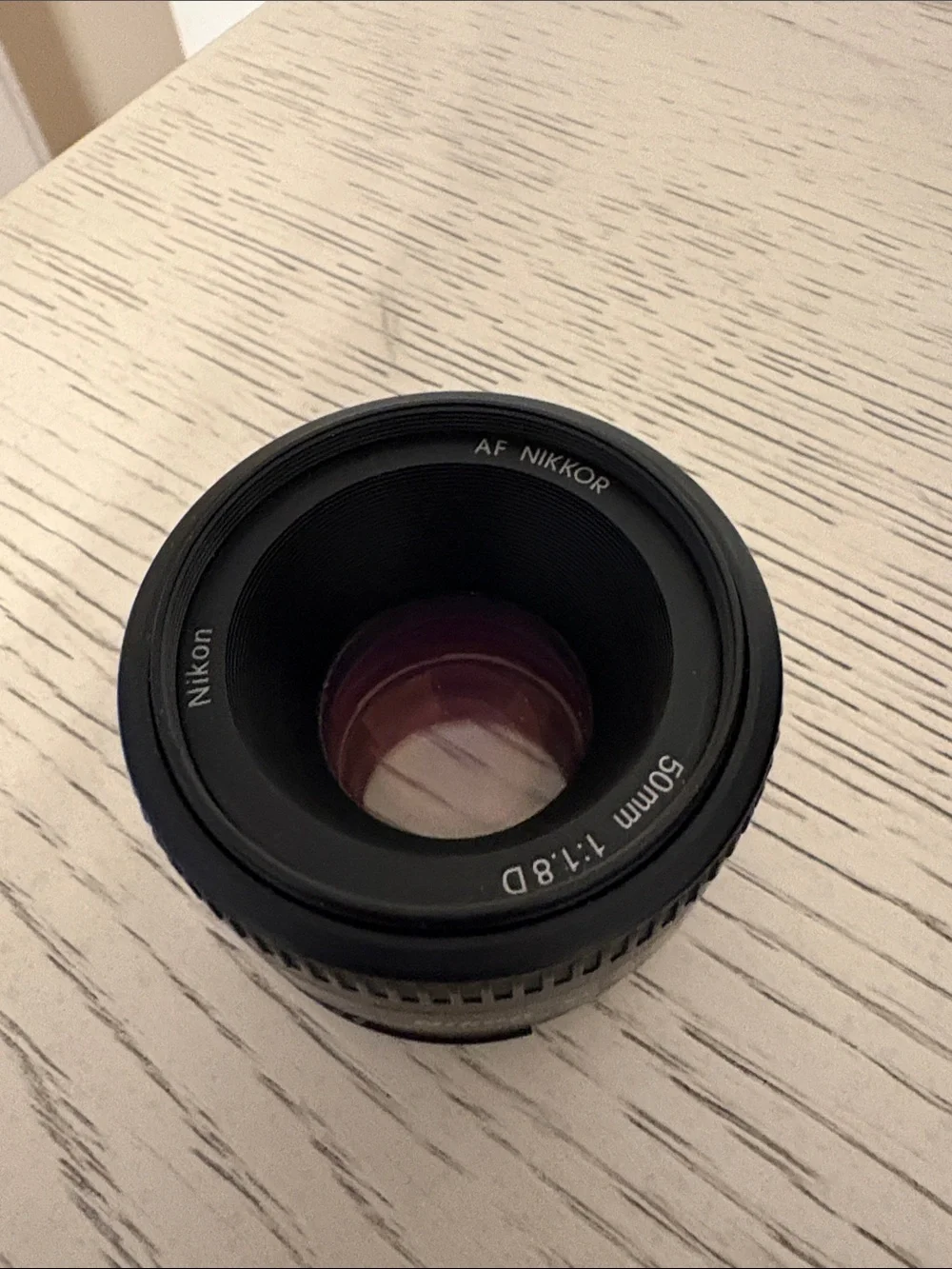 Nikon 50mm f/1.8D Prime Lens — Black with Subtle Purple Coating